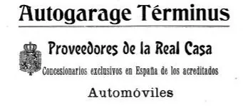 Sign “Autogarage Términus, Proveedores de la Real Casa, concesionarios exclusivos en España de los acreditados automóviles” (Purveyors to the Royal Household, sole agents in Spain), with the royal coat of arms