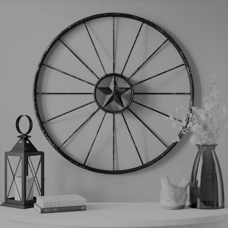 Old spoked wheel used as wall decoration beside a lantern, illustrating the decoration of the premises